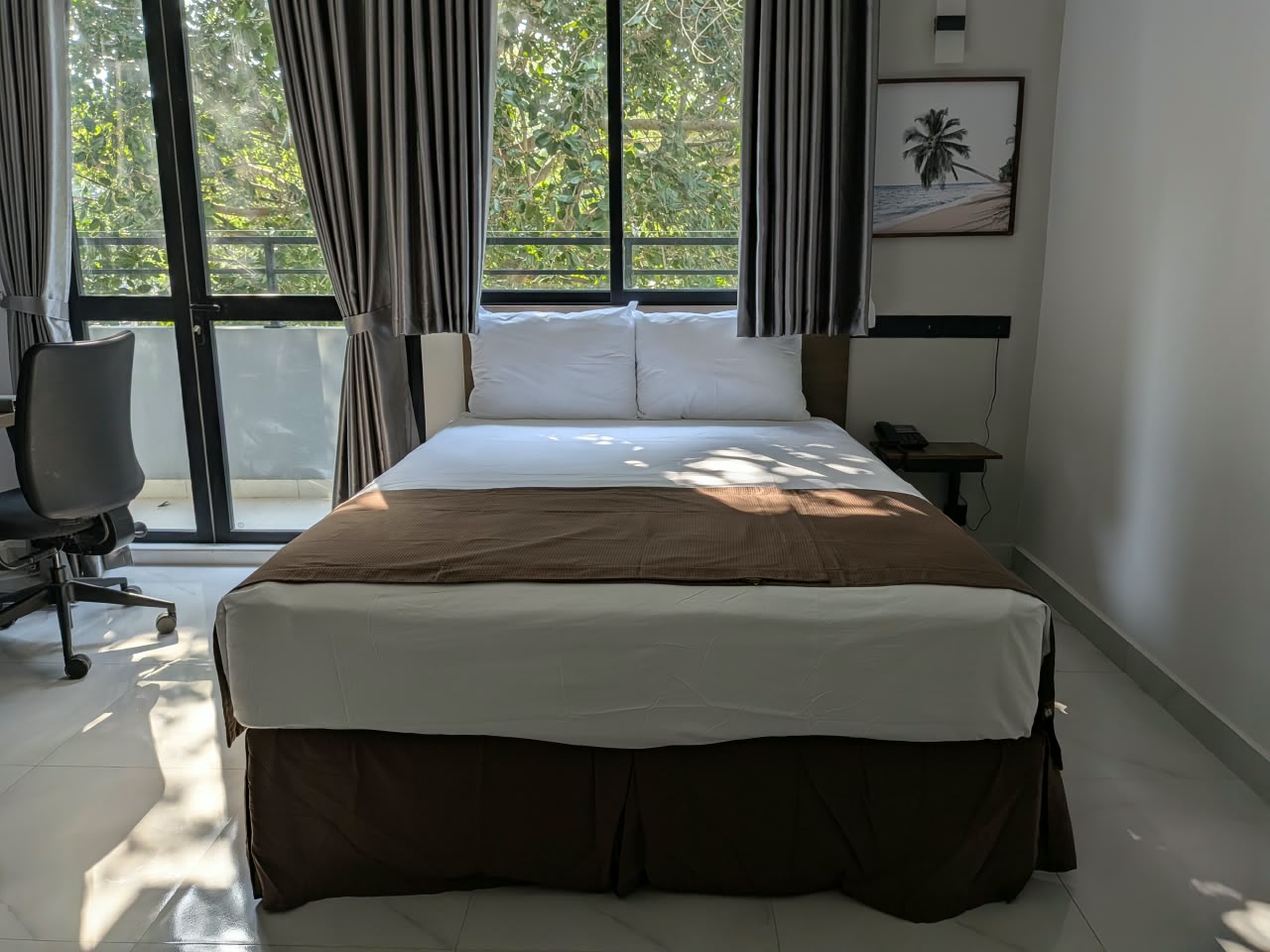 Bright deluxe room with garden views